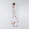 Fortifura Calvi douchekraan met glijstangset met ronde handdouche, gladde doucheslang Geborsteld koper PVD (Koper) SW1079940