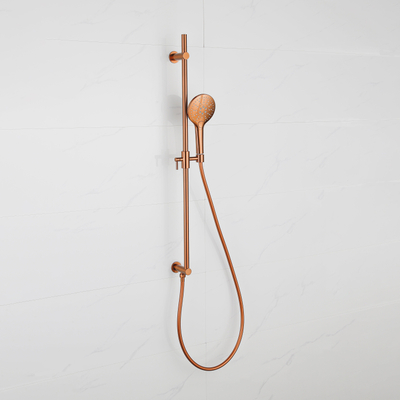 Fortifura Calvi Glijstangset - geïntegreerde wandaansluitbocht - doucheslang glad- ronde handdouche - Geborsteld koper PVD (Koper)